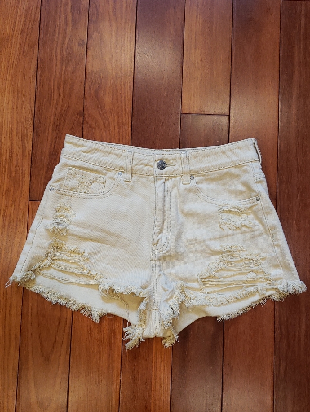 Pac Sun Women's size 26 Mom Short. Light yellow destructed denim jean